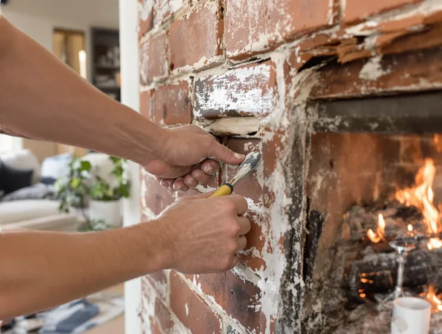 Routine fireplace repair by Bellingham Chimney Sweep in Bellingham, MA